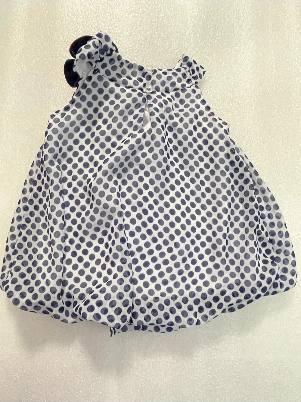 Rare Editions Gray Polka Dot Bib with Red Flower Accent